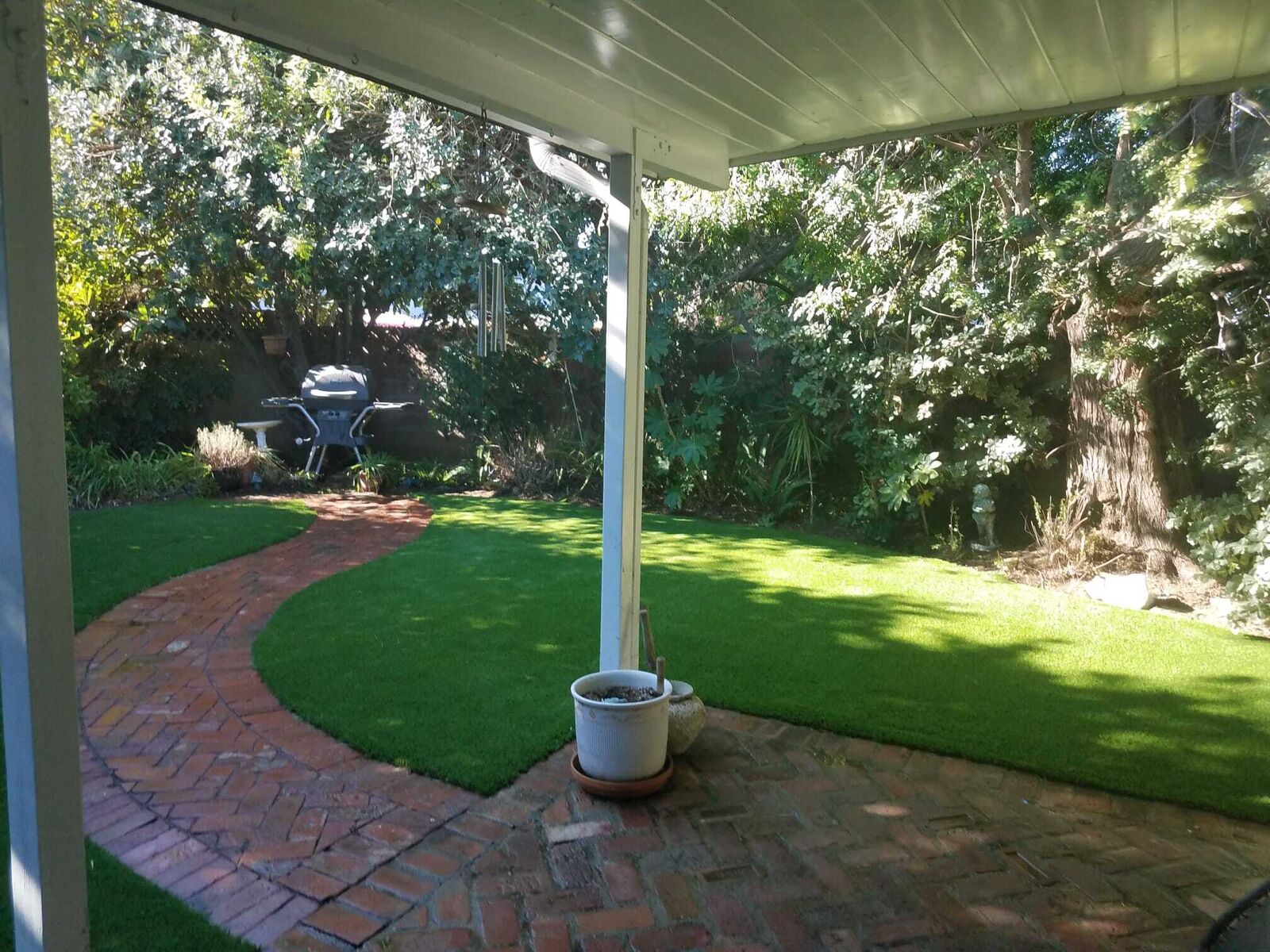 Putting green surrounded by a concrete patio