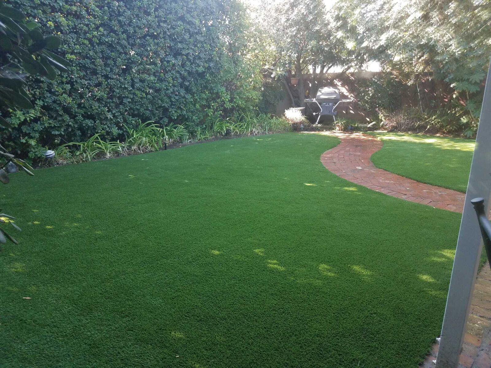 Backyard putting green with multiple cups
